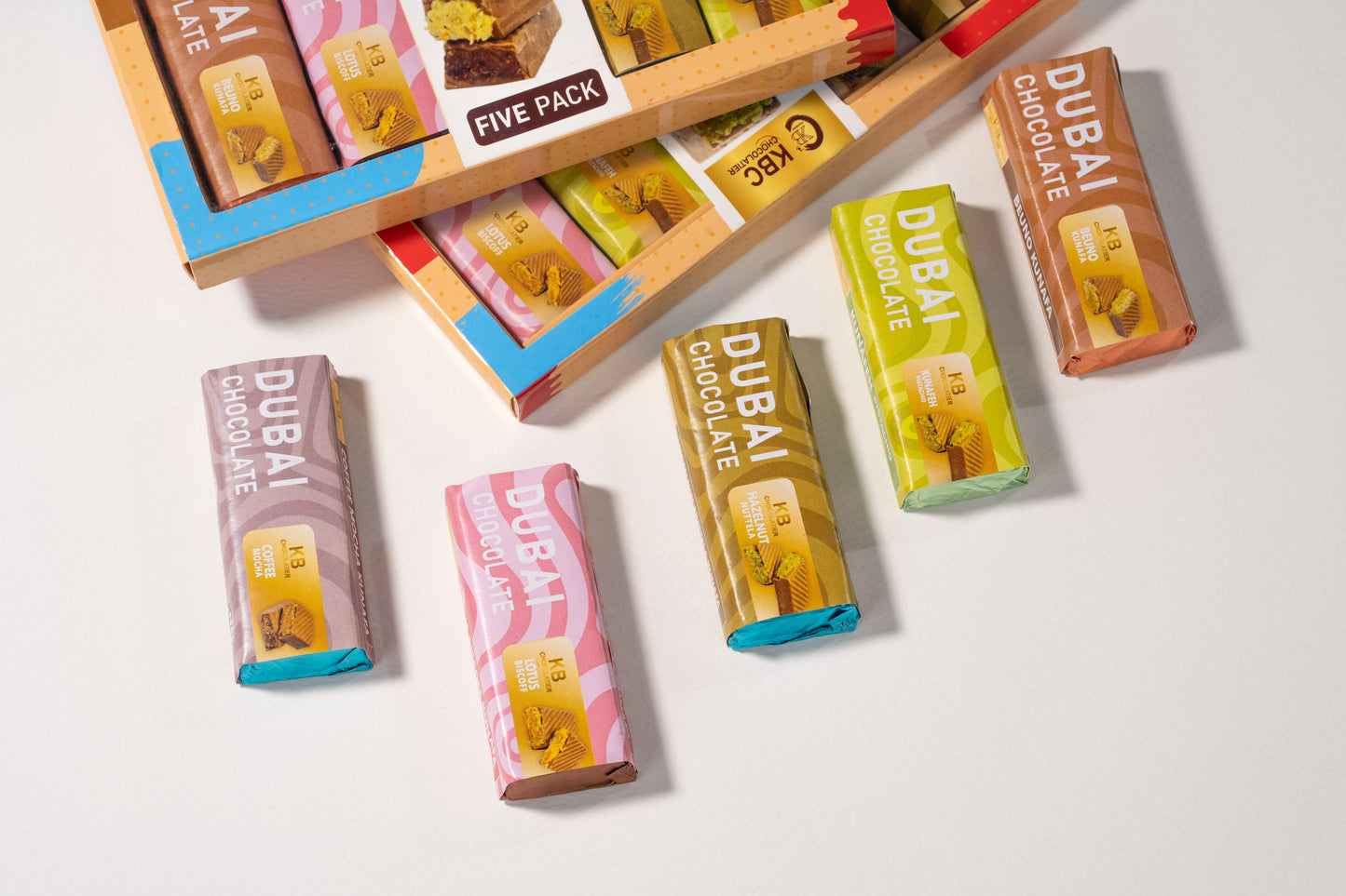 Mini Bars, Max Indulgence [5 mini 500gm bars ]- Pistachi , Lotus , Nuttela ,Coffee , Beuno Kunagfa mini bars [50gm]